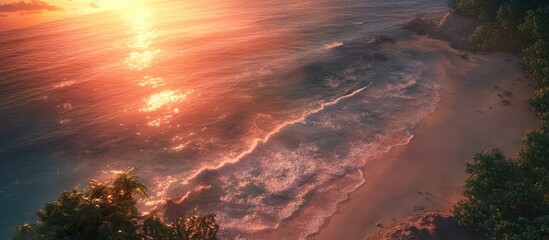Aufkleber - Sunset over a serene beach with vibrant orange and pink hues reflecting on calm waters, shoreline framed by lush greenery and gentle waves.