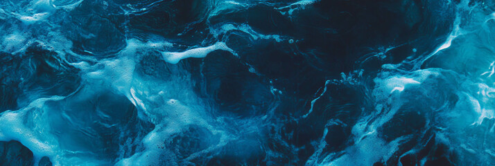 Poster - Indigo blue water with intense ripples and gentle waves creating a serene backdrop