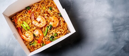 Aufkleber - Delicious shrimp stir-fried noodles in a white box on a textured gray background with vibrant orange, green, and yellow colors throughout.