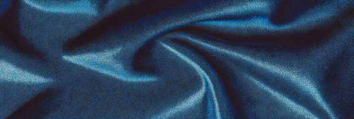 Poster - Navy blue suede fabric displaying smooth texture and deep shadows in cool lighting