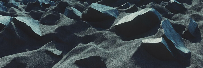 Poster - Black sand beach texture with coarse basalt fragments and deep shadows