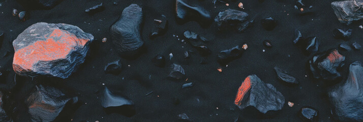Poster - Textured black sand contrasted with small lava rocks displaying unique geological features