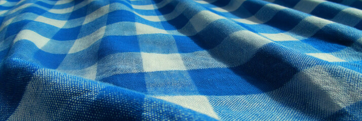 Poster - Soft blue cotton tablecloth with a large checkered pattern perfect for casual dining settings