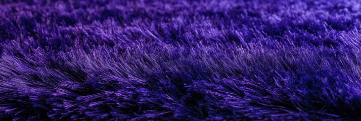 Poster - Deep purple carpet texture showcasing dense cut and loop design with varied pile heights