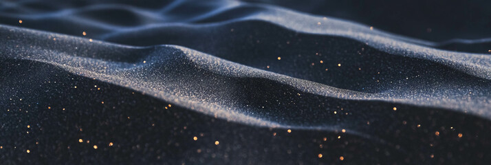 Poster - Texture of dry black sand with fine dust and soft lighting creates an atmospheric landscape