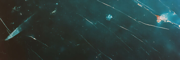 Poster - Dust-covered film texture with scratches reveals a vintage aesthetic and low reflectivity
