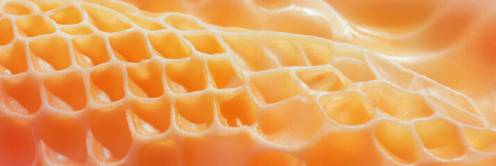 Poster - Golden cone wafer with crispy texture and uneven diamond patterns highlighted in detail
