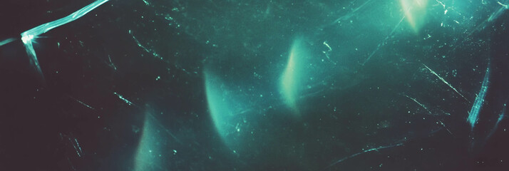 Poster - Exploration of scratched film texture with dark shadows and subtle grain patterns