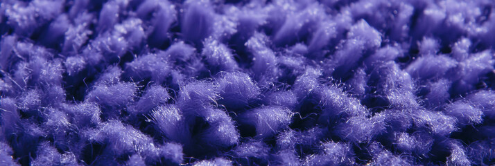 Poster - Dense lavender frieze carpet texture showcases tightly wound pile and deep shadows
