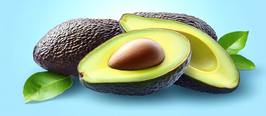 Poster - Fresh ripe avocados sliced with seeds and green leaves displayed on a vibrant blue background top view close-up showcasing their textures and colors