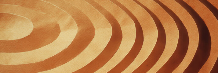 Aufkleber - Medium brown textured paper with concentric grooves and a slight sheen, perfect for crafts