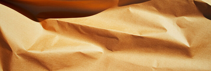 Poster - Texture of medium brown paper with subtle grain and uneven surface in a creative setting