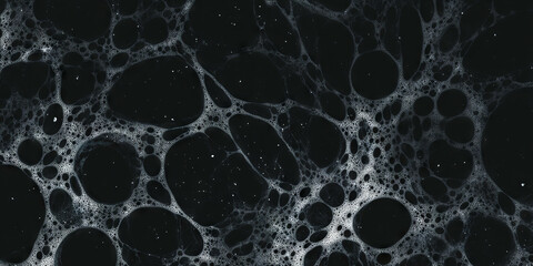 Poster - Mottled black and white texture with dense dots and shadows on a dark background