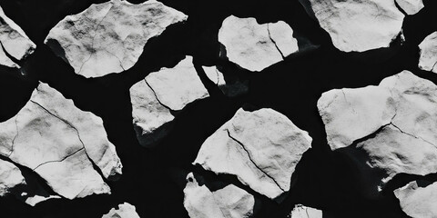 Poster - Mottled black and white texture with overlapping areas and dark shadows on a black background