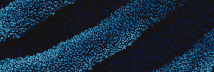 Poster - Dense navy blue berber carpet with looped pile and subtle texture in even lighting