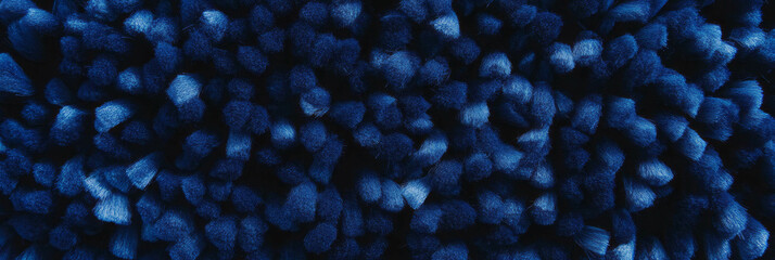 Poster - Dense navy blue berber carpet showcasing tightly looped pile and rich texture