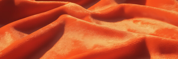 Poster - Soft plush texture of vibrant orange velvet tablecloth enhancing table decor