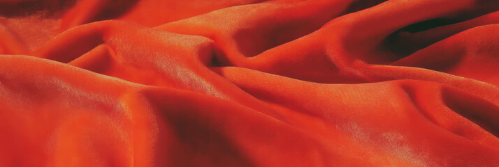 Poster - Luxurious orange velvet tablecloth with rich texture and deep pile