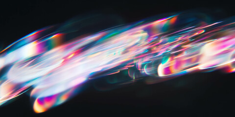 Fototapete - Dynamic shimmering light distribution with concentrated bokeh on a black background