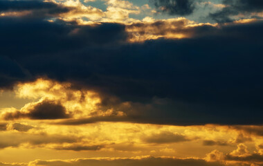 Wall Mural - beautiful and dramatic sunset sky with clouds as abstract background