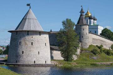 Wall Mural - The ancient Flat Tower of the Pskov Kremlin on a sunny June day. Pskov, Russia