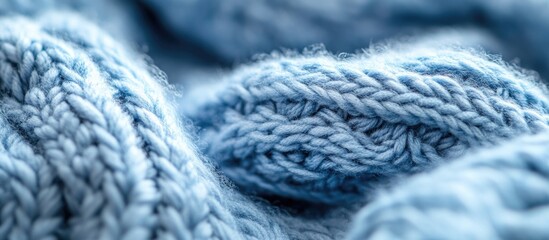 Aufkleber - Closeup of soft blue wool knitted texture showcasing intricate patterns and plush fibers for cozy textile design backgrounds.