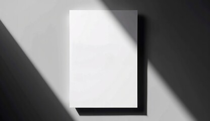 Blank flyer mockup with dramatic shadows on gray background and copy space for designs