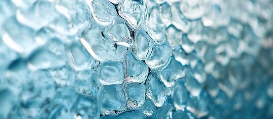 Aufkleber - Textured silver metal mesh overlaying a vibrant blue glass surface creating a dynamic visual pattern and contrast.