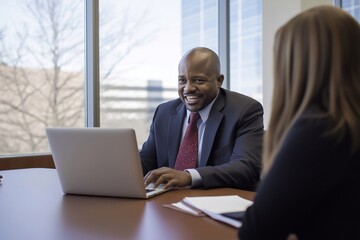 Busy professional employees using laptop discussing project. Business team two man and woman talking working together. African American bank manager consulting client at office meeting.