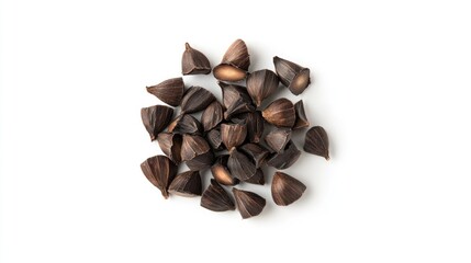 pile of buckwheat seeds on white background. possible use food ingredient or seed for display