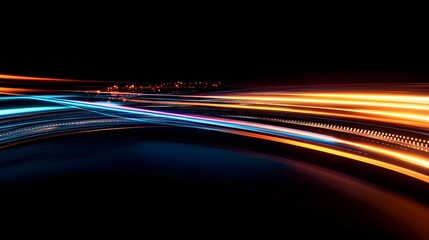 Fototapete - Blurred light trails illuminating a city road at night depicting a sense of high speed motion energy and the dynamic nature of urban transportation and travel  The image showcases a modern