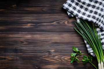 Aufkleber - Rustic wooden background with fresh green onions and a napkin, top-down view with space for text
