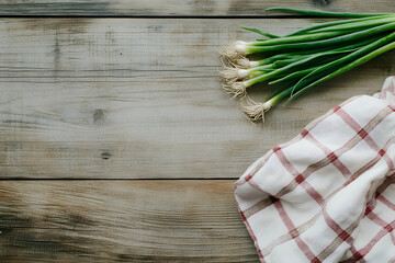 Aufkleber - Rustic wooden background with fresh green onions and a napkin, top-down view with space for text