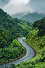 Wall Mural - Winding Road in Lush Green Valley