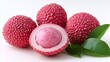 © creative - Fresh lychees showing juicy pulp and green leaves on white background