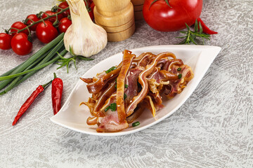 Wall Mural - Sliced smoked pork ear snack