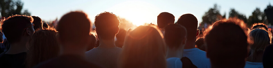 Wall Mural - Crowd of People Silhouetted Against Sunset