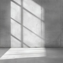 Poster - Light streams through window panes, casting intricate shadows on the cold cement wall, creating a stark yet beautiful contrast in this serene environment at midday