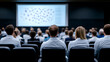 © A2Z AI  - Audience members attend a conference, focusing on a screen displaying complex data at the front of a dark auditorium with rows of seats.