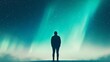 © Design@22 - Silhouette of a person standing under the Northern Lights, deep serenity