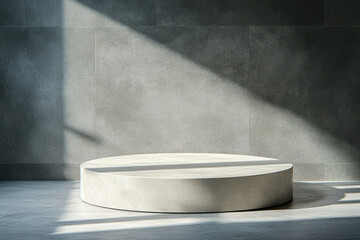 Poster - A minimalist cylindrical concrete pedestal sits in a sunlit room against a textured wall.