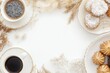 © Odrua Design - Xícara de café elegante com detalhes dourados, acompanhada de doces e decorações festivas em fundo branco, criada com IA generativa para um visual sofisticado e convidativo