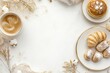 © Odrua Design - Xícara de café elegante com detalhes dourados, acompanhada de doces e decorações festivas em fundo branco, criada com IA generativa para um visual sofisticado e convidativo