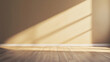 © PhotoArtHub - Empty room with sunlight shining through the window, casting shadows on the wooden floor, representing peaceful ambiance, simplicity, and calmness in interior design.