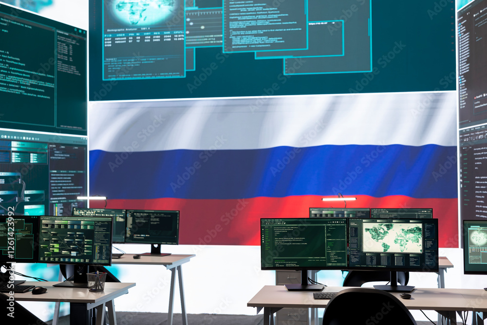 Governmental cyber operations room with Russian flag on big screen ...