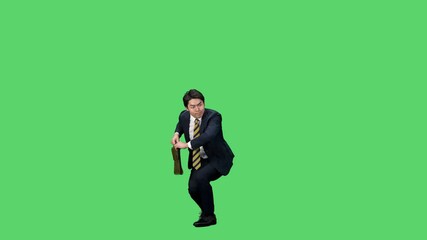 Fototapete - バッグを持ってダンスする男性ビジネスパーソンの全身動画　クロマキー合成用グリーンバック映像