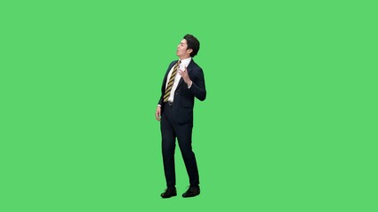 Leinwandbilder - 仕事をしながらダンスする男性ビジネスパーソンの全身動画　クロマキー合成用グリーンバック映像