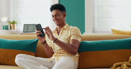 Poster - Happy man, couch or phone texting on social media for rest or comfort on weekend in home. Living room, technology and male person with smile on couch for calm peace, message and online dating on app