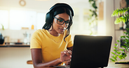 Poster - Laptop, music and thinking with Indian woman in home office as graphic designer for marketing campaign. Computer, headphones and remote work with freelance employee in apartment for publication