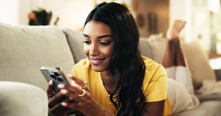 Aufkleber - Relax, reading and woman with smartphone, home and smile for romance ebook, online and comfortable. Lounge, resting and entertainment for person with mobile, website and browsing of novel in house